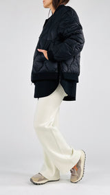 Piumino over+velour Vic.