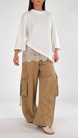 T-shirt over asimmetrica pizzo H.