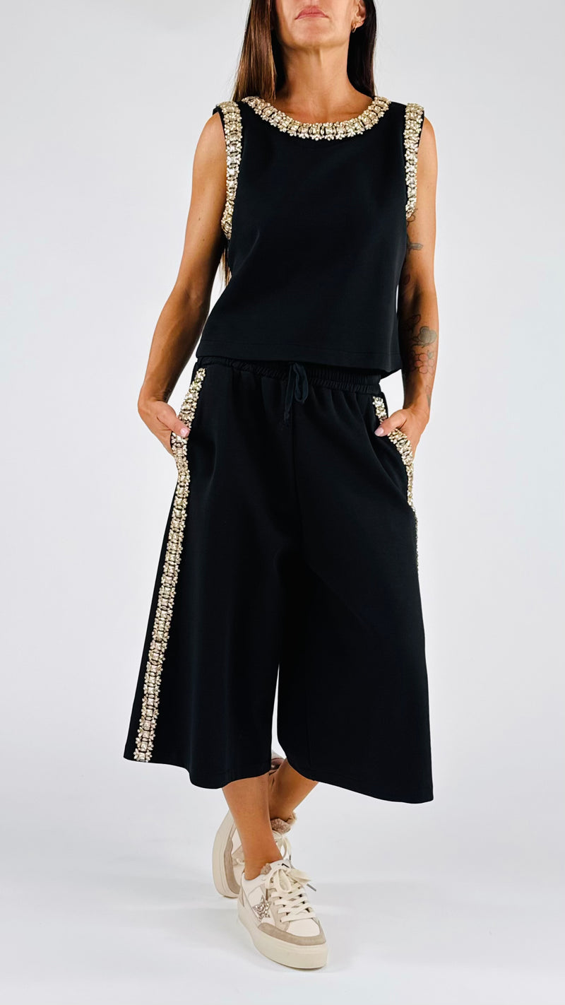 Top felpa strass T.