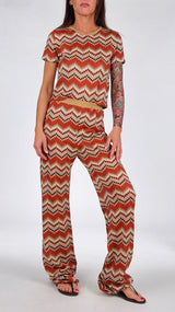 Pantalone zig zag bordi oro Vic.